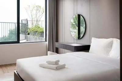 Quadruple Room with Lake View — Bach Plateaus Hotel